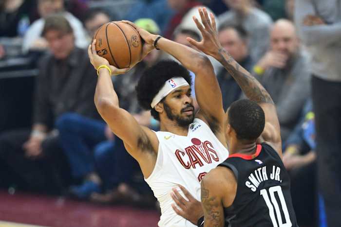 Dec 18, 2023; Cleveland, Ohio, USA; Cleveland Cavaliers center Jarrett Allen (31) looks to pass beside Houston Rockets forward Jabari Smith Jr. (10) in the first quarter at Rocket Mortgage FieldHouse.